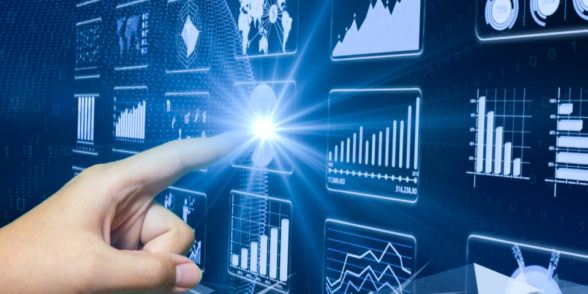 A hand pointing towards a screen with many different graphs