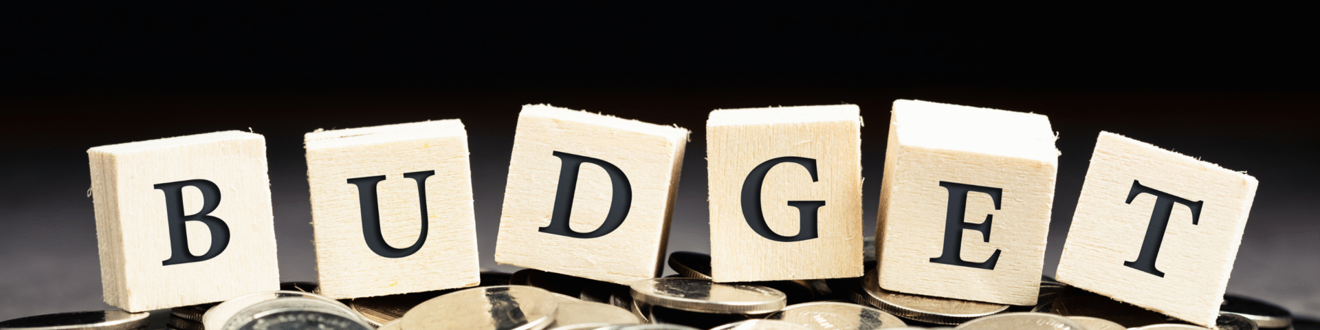 Scrabble pieces spelling the word "Budget" representing 2025 budget and what it means for HR Leaders